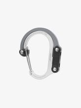 Load image into Gallery viewer, Pictured in grey for the swivel hook and silver for the rest of the clip is a closed, medium-sized metal carabiner. This is the HeroClip Medium in Shade Of Grey. Perfect for your roof top tent adventure camp tool hanging needs! Available for sale by SMRT Tent in Edmonton, Canada.