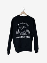 Load image into Gallery viewer,  Pictured is the back of a Black Crewneck sweatshirt which depicts in white outline; three mountains overlapping and 4 simple pine trees surrounding a Land Rover Defender 110 SUV with a hard shell roof top tent on its roof rack. The words above the image say Camp SMRT EST 2020 and are written in white. With the same for the words below the image that say Stay Adventurous. nt in this comfy crew! Available for sale by SMRT Tent in Edmonton, Canada.