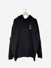 Load image into Gallery viewer, Pictured is the front of a Black drawstring hoodie with the words Get Out More. stitched over the upper-left chest area in a light Golden-Yellow. Chill out around your SMRT Tent roof top tent or get out more by hiking in this cozy hoodie! Available for sale by SMRT Tent in Edmonton, Canada.