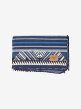 Load image into Gallery viewer, Pictured is a blue and white patterned, neatly folded baby blanket. This is the Heartprint Threads 'Small and Mighty' Baby Blanket, created by Ecuadorian Artisans. Perfect for your everyday soft & warm baby blanket needs! Available for sale at SMRT Tent in Edmonton, Canada.