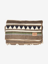 Load image into Gallery viewer, Pictured is a brown, patterned and neatly folded blanket. This is a Heartprint Threads Tree Line Queen Blanket, created by Ecuadorian Artisans. Throw this warm blanket over your sleeping bag while camping outdoors! Available for sale at SMRT Tent in Edmonton, Canada.