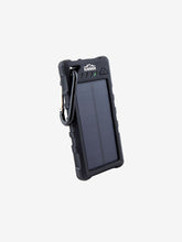 Load image into Gallery viewer, Pictured is a portable, Black solar powered power bank with its own medium-sized, black carabiner. The top end has a charging status shown by 4 LED lights and written above them is the logo for Kanan Outdoors written in white as KANAN and a stylized mountain. This is the Weatherproof Solar Power Bank and Flashlight with its own solar panel. Perfect while on your overland roof top tent camping for any recharging and flashlight needs! Available for sale by SMRT Tent in Edmonton, Canada.
