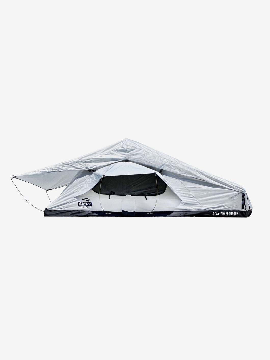 Pictured in a light, white-ish grey is a completely set-up softshell roof top tent. This is “The” Softshell, a roof top tent perfect for all overland roof top tent family outdoor camping! Available for sale by SMRT Tent in Edmonton, Canada.