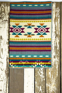 Pictured is a cream, dark goldish yellow, orange, wine red magenta, aqua blue, dark brownish red, teal and white coloured, traditional Aztec patterned baby blanket. This is the technicolour Heartprint Threads 'Baby Stardust' Baby Blanket, created by Ecuadorian Artisans. Perfect for your SMRT Tent roof top tents for trucks baby blanket needs! Available for sale at SMRT Tent in Edmonton, Canada.