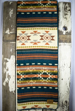 Load image into Gallery viewer, Pictured is an orange, patterned and laid-out blanket. This is the Heartprint Threads ‘Vintage Velvet’ Aztec Series Double Blanket, created by Ecuadorian Artisans. Throw this warm blanket over your sleeping bag while camping outdoors! Available for sale at SMRT Tent in Edmonton, Canada.
