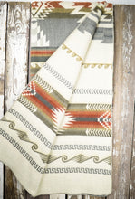 Load image into Gallery viewer, Pictured is a cream, grey &amp; olive, wave-patterned, laid-out and folded-out blanket. This is the Heartprint Threads &#39;Mosaic Pebble&#39; Maskuy Collection Queen Blanket, created by Ecuadorian Artisans.  Throw this warm blanket over your sleeping bag while camping outdoors! Available for sale at SMRT Tent in Edmonton, Canada.
