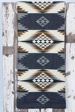 Load image into Gallery viewer, Pictured is a slate-coloured, patterned and laid-out blanket. This is the Heartprint Threads &#39;Anchor&#39; Queen Blanket, created by Ecuadorian Artisans. Throw this warm blanket over your sleeping bag while camping outdoors! Available for sale at SMRT Tent in Edmonton, Canada.
