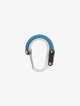 Load image into Gallery viewer, Pictured in metallic blue for the closed swivel hook and silver for the rest of the clip, is a small-sized metal carabiner. This is the HeroClip Small in Blue Steel. Perfect for your roof top tent adventure camp tool hanging needs! Available for sale by SMRT Tent in Edmonton, Canada.

