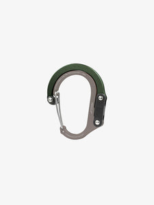 Pictured in metallic forest green for the closed swivel hook and matte greyish, tan mauve for the rest of the clip, is a small-sized metal carabiner. This is the HeroClip Small in Forest Green. Perfect for your roof top tent adventure camp tool hanging needs! Available for sale by SMRT Tent in Edmonton, Canada.