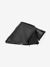 Load image into Gallery viewer, Pictured is a matte, all-black, completely set-up hard shell roof top tent. This is the medium-sized Sky Loft, a 2-person hard shell roof top tent perfect for all overland roof top tent family outdoor camping! Available for sale by SMRT Tent in Edmonton, Canada.
